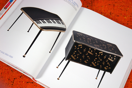 pair of shiny black vintage 1950s tables with piano and musical note design and motifs