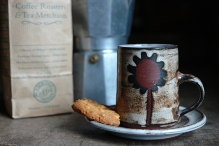 Vintage Briglin coffee cup & saucer with Italian espresso coffee maker and brown paper bag of coffee beans