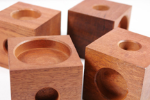 set of four vintage teak candle holders