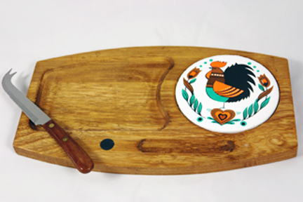 vintage cheese board with ceramic tile insert decorated with a cockerel
