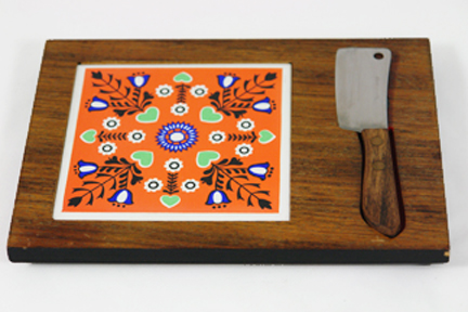 vintage cheese board with orange ceramic tile insert and knife