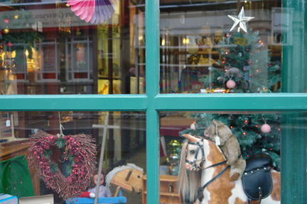 vintage Christmas decorated shop window of Picture House Antiques in Todmorden