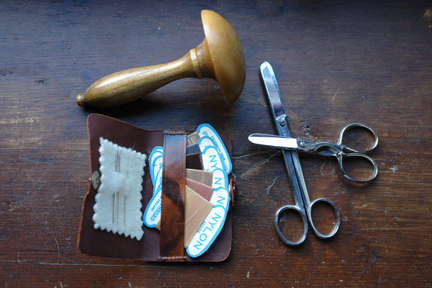 vintage darning mushroom, scissors and pocket darning kit