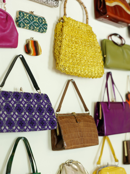 Bags on the wall of H is for Home's master bedroom