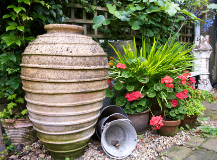 Urn in H is for Home's back garden