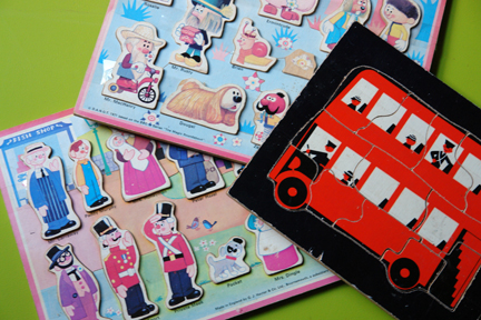 three vintage children's jigsaws: red London double decker bus, Magic Roundabout characters and Trumpton characters three vintage children's jigsaws: red London double decker bus, Magic Roundabout characters and Trumpton characters