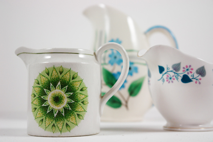 trio of vintage milk jugs
