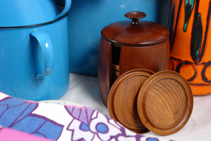 selection of antique & vintage homewares bought at Lincoln Show highlighting a set of 1950s teak coasters in a matching lidded holder