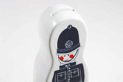 detail of vintage Carltonware moneybox in the shape of a British Bobby