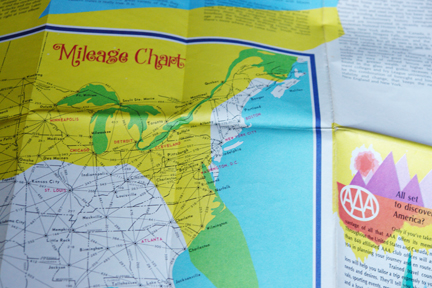 detail of a vintage travel map from the 1960s showing a mileage chart