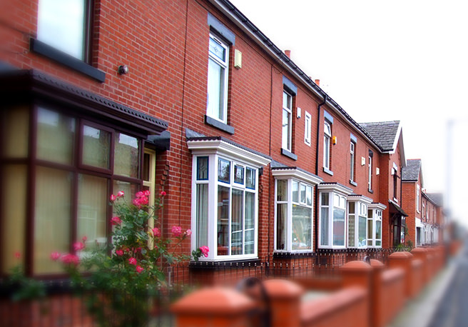 Row of red brick terraced houses Row of red brick terraced houses