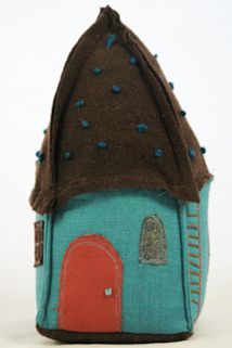 green fabric doorstop / bookend handmade by Sarah Nicol