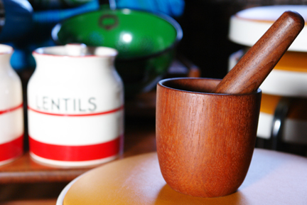 detail of small teak Scandinavian mortar & pestle