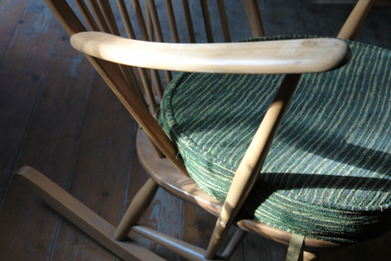 detail of a vintage Ercol beechwood rocking chair