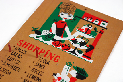 detail from a vintage 1950s wooden shopping list reminder board
