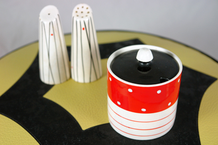 trio of new H is for Home stock items; Kirkham Pottery salt & pepper and preserve pot on a yellow 1950s leatherette footstool