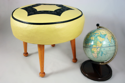 new H is for Home stock items; yellow 1950s leatherette footstool and vintage Chad Valley tin globe