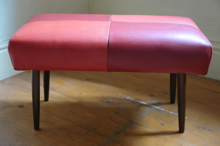 vintage 1950s footstool with red vinyl seat