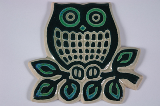 pottery pan trivet / pot stand in the shape of an owl