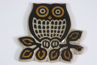 pottery pan trivet / pot stand in the shape of an owl