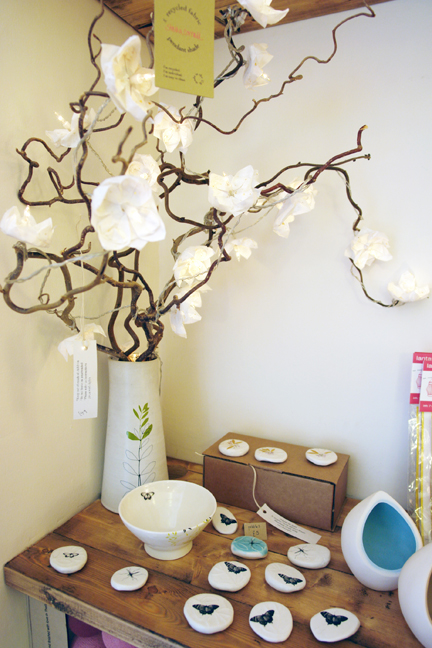 fairy lights wrapped around willow and butterfly decorated pebbles fairy lights wrapped around willow and butterfly decorated pebbles