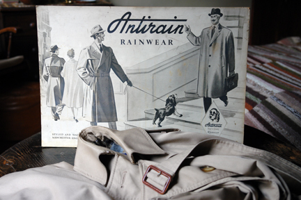 vintage shop advertising sign for Antirain Rainwear