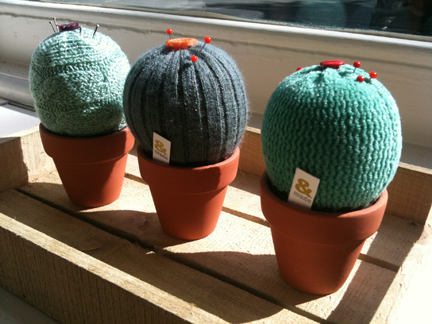 trio of small textile cacti pin cushions in terracotta pots made by Andrea Lord of &made available at Snug Gallery in Hebden Bridge