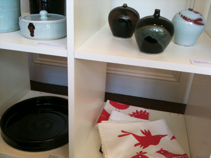 shelves showing various art & craft items available at Snug Gallery in Hebden Bridge