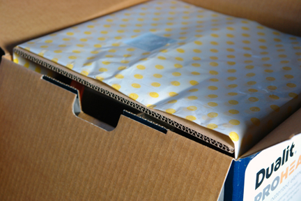 open cardboard box containing my birthday present open cardboard box containing my birthday present