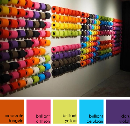 Wall of renova toilet paper in a rainbow of colours