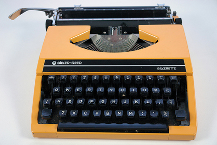 vintage 1970s orange Silver Reed 'Silverette' typewriter vintage 1970s orange Silver Reed 'Silverette' typewriter