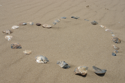 heart in the sand made from shells on the beach between Wells-next-the-Sea and Holkham