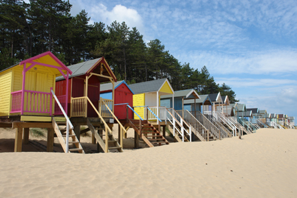 colourful beach huts on the beach between Wells-next-the-Sea and Holkham