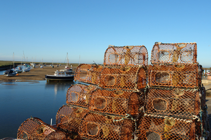crabpots stacked up in the harbour, Wells-next-the-Sea