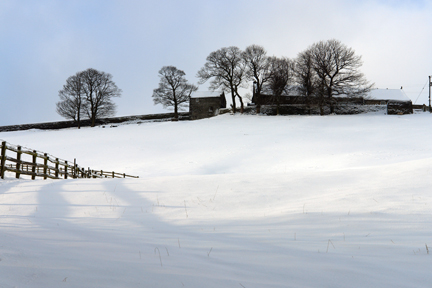 farm on Todmorden Edge in the snow farm on Todmorden Edge in the snow
